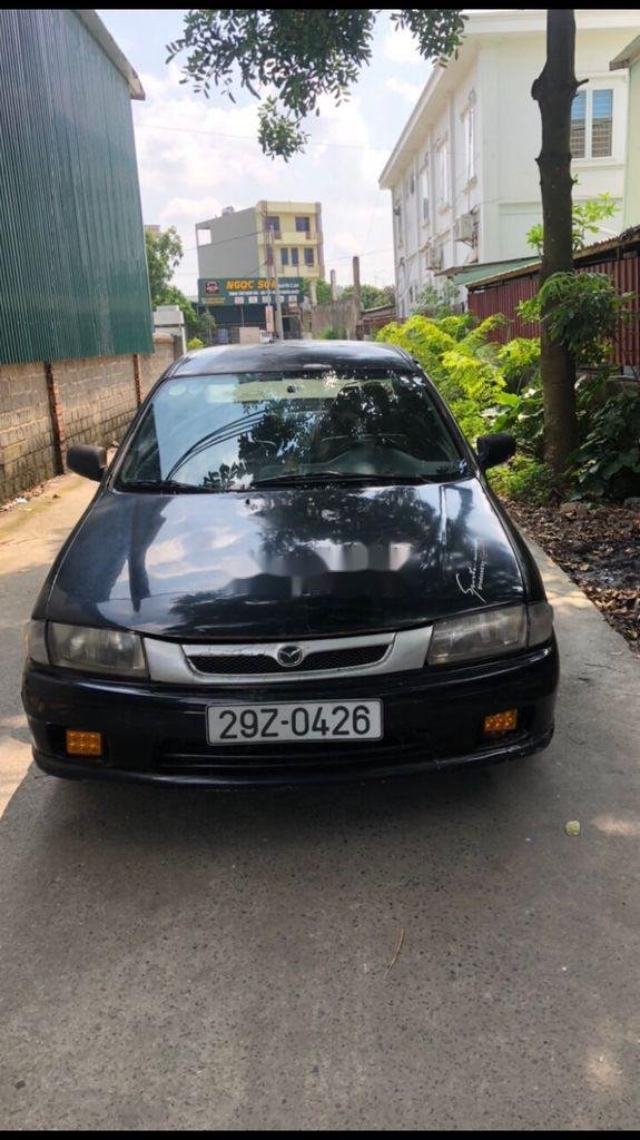 Mazda 323 2000 - Bán ô tô Mazda 323 năm sản xuất 2000, màu đen, xe nhập, giá chỉ 43 triệu