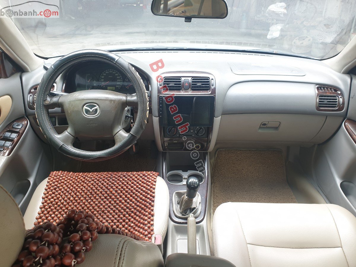 Mazda 626   2.0 MT  2003 - Bán ô tô Mazda 626 2.0 MT năm 2003, màu bạc còn mới  