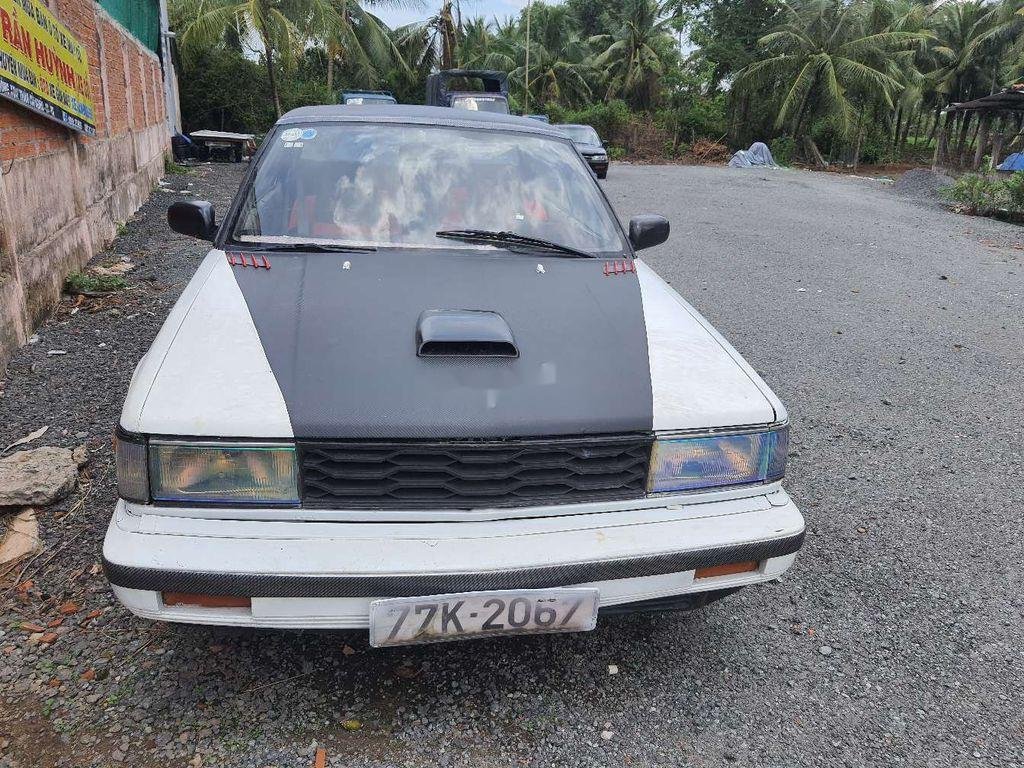 Nissan Bluebird 1986 - Bán xe Nissan Bluebird đời 1986, hai màu đen trắng, nhập khẩu giá cạnh tranh