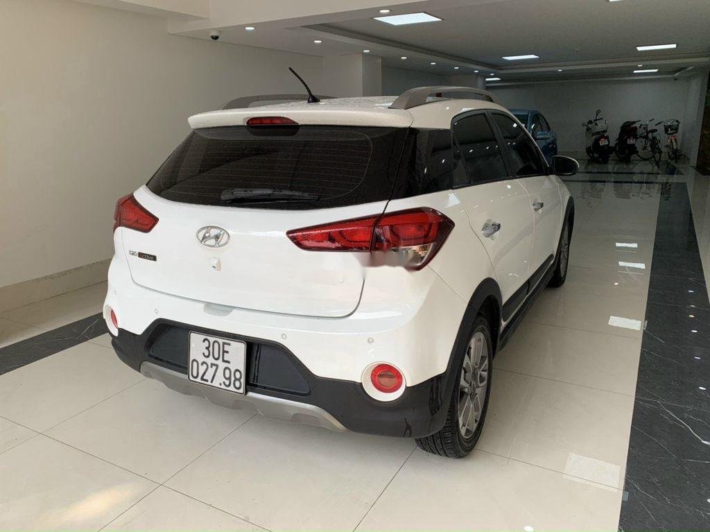 Hyundai i20 Active 2015 - Cần bán gấp Hyundai i20 Active đời 2015, màu trắng, nhập khẩu Hàn Quốc