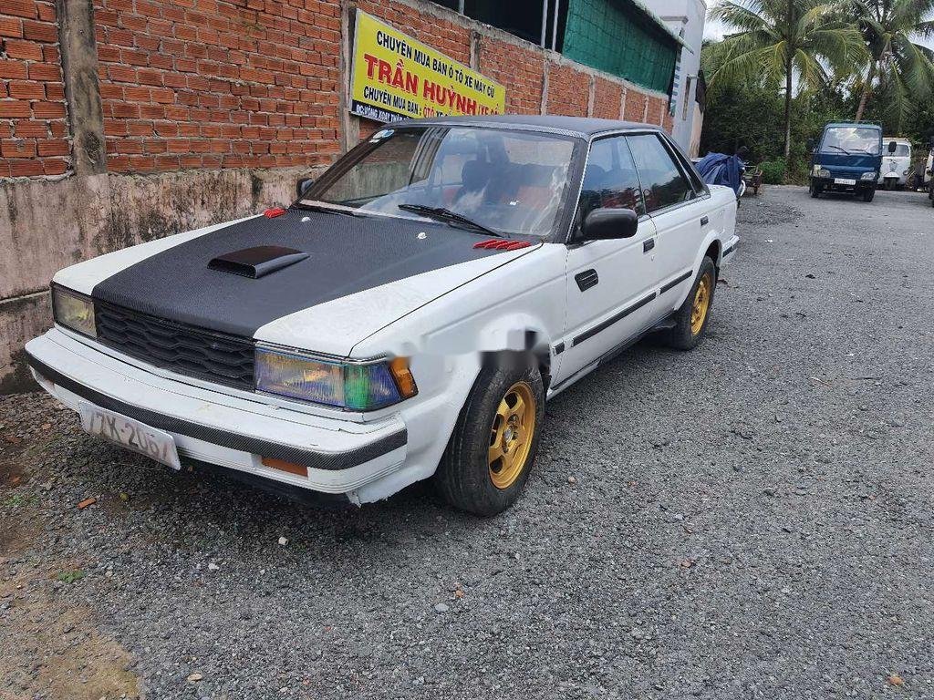 Nissan Bluebird 1986 - Bán xe Nissan Bluebird đời 1986, hai màu đen trắng, nhập khẩu giá cạnh tranh