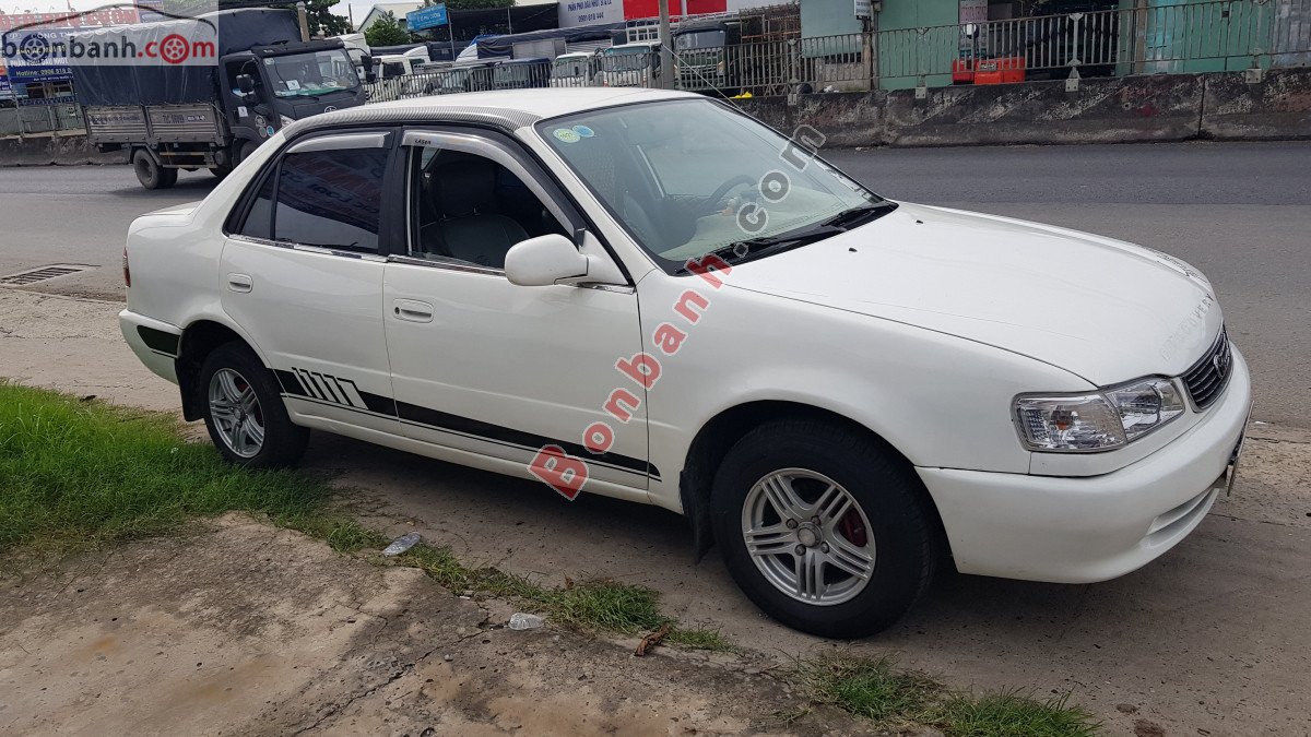 Toyota Corolla   XLi 1.3 MT 1999 - Bán Toyota Corolla XLi 1.3 MT năm 1999, màu trắng, xe nhập