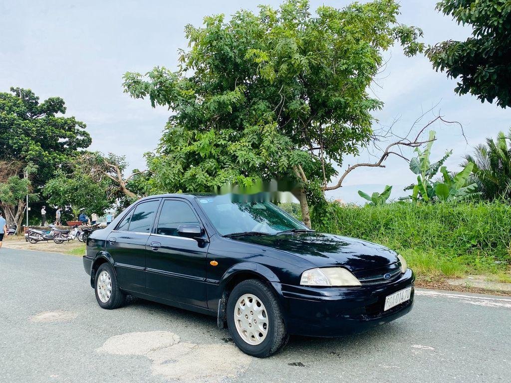 Ford Laser 2001 - Xe Ford Laser đời 2001, màu đen còn mới  