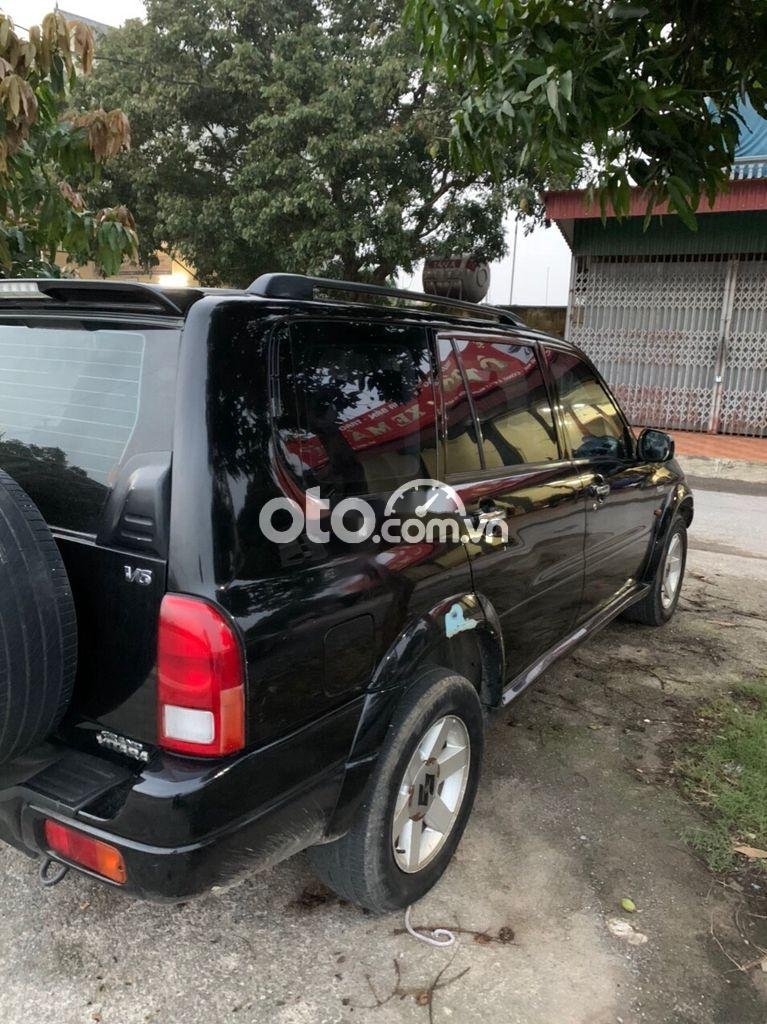 Suzuki Grand vitara   2003 - Bán xe Suzuki Grand vitara năm 2003, màu đen, nhập khẩu 