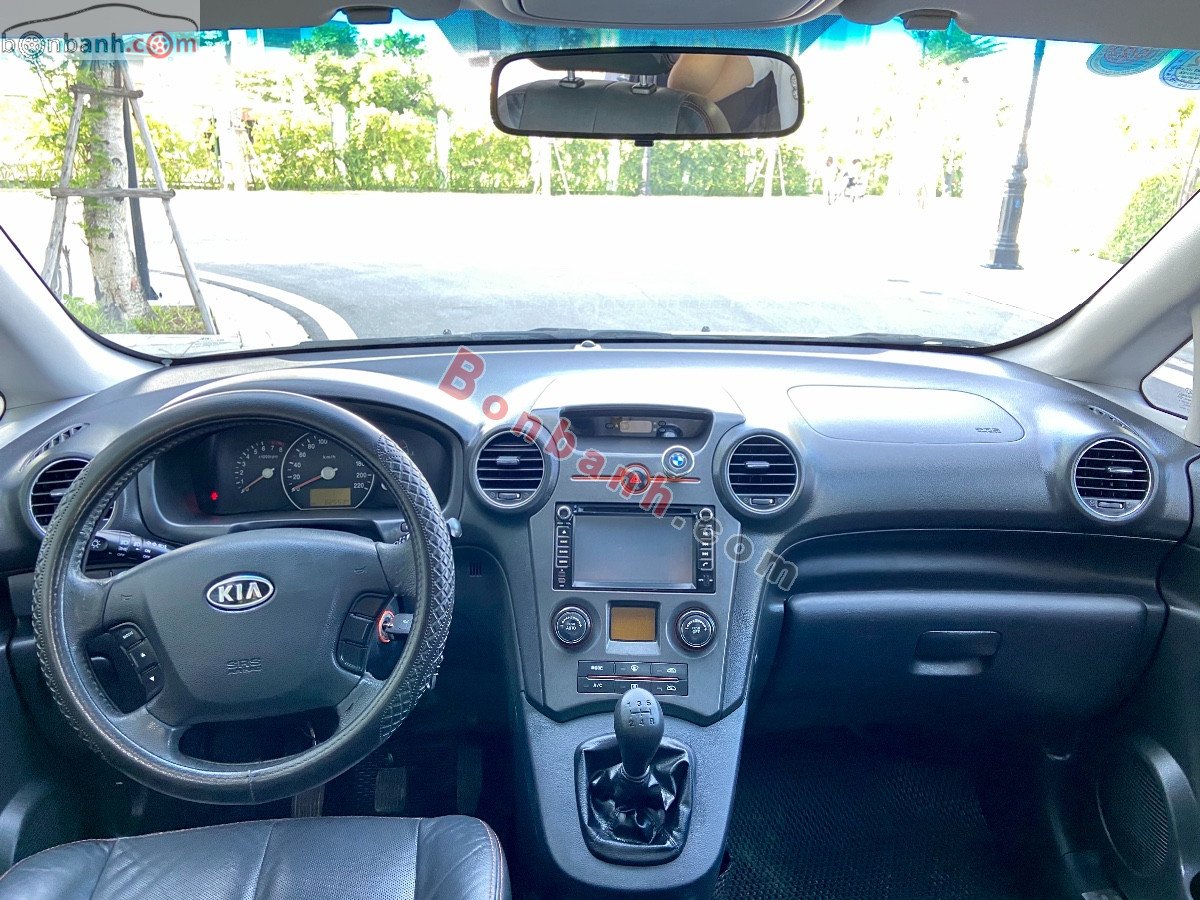 Kia Carens   SX 2.0 MT 2014 - Cần bán gấp Kia Carens SX 2.0 MT năm sản xuất 2014, màu bạc còn mới