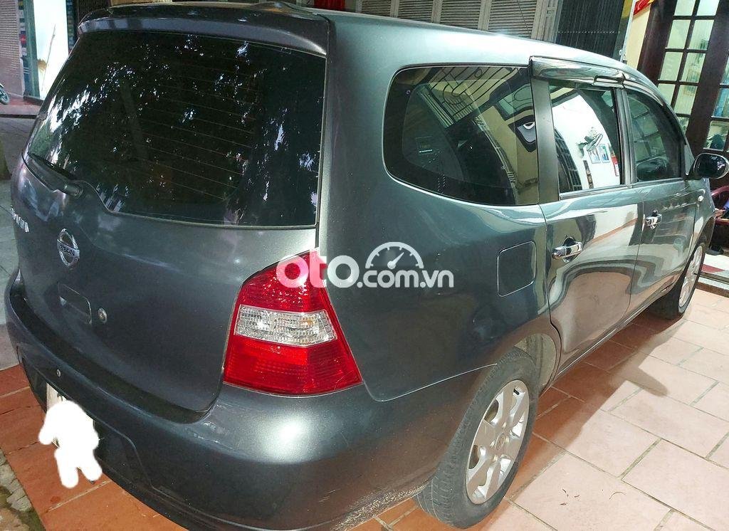 Nissan Livina  1.8 MT 2011 - Bán Nissan Livina 1.8 MT 2011, màu xanh lục xe gia đình