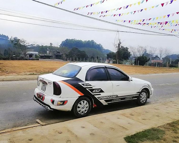 Daewoo Lanos   SX 2002 - Bán ô tô Daewoo Lanos SX đời 2002, màu trắng số sàn