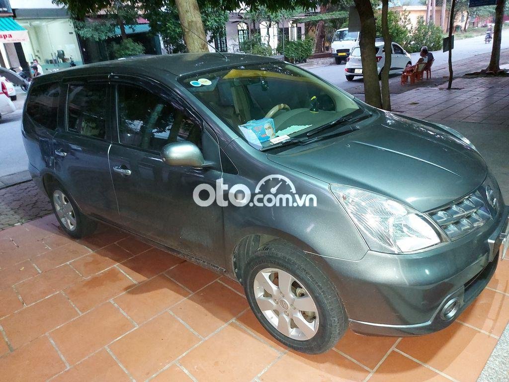 Nissan Livina  1.8 MT 2011 - Bán Nissan Livina 1.8 MT 2011, màu xanh lục xe gia đình