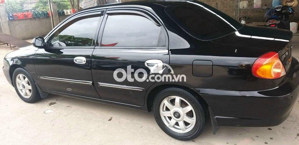 Kia Spectra 2004 - Bán ô tô Kia Spectra đời 2004, màu đen