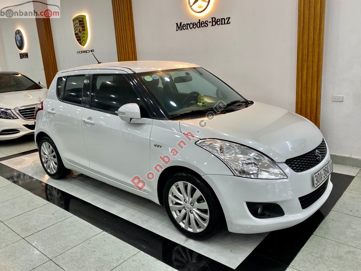 Suzuki Swift   1.4 AT  2014 - Cần bán xe Suzuki Swift 1.4 AT 2014, màu trắng chính chủ, giá chỉ 329 triệu