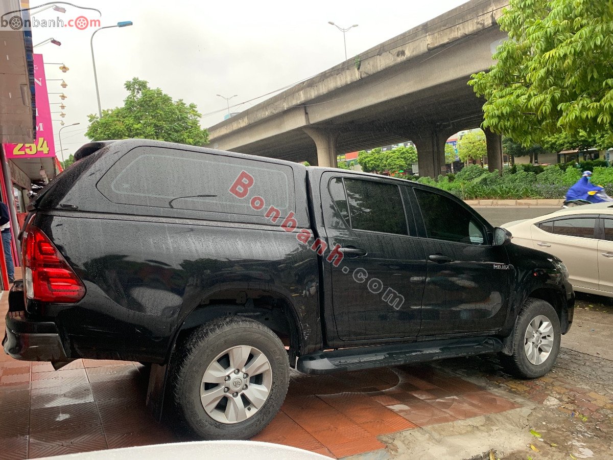 Toyota Hilux   2.4E AT  2020 - Cần bán xe Toyota Hilux 2.4E AT năm sản xuất 2020, màu đen, nhập khẩu 