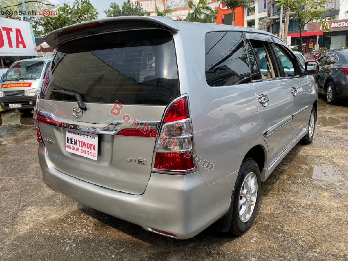 Toyota Innova   2.0E 2014 - Cần bán Toyota Innova 2.0E sản xuất năm 2014, màu bạc