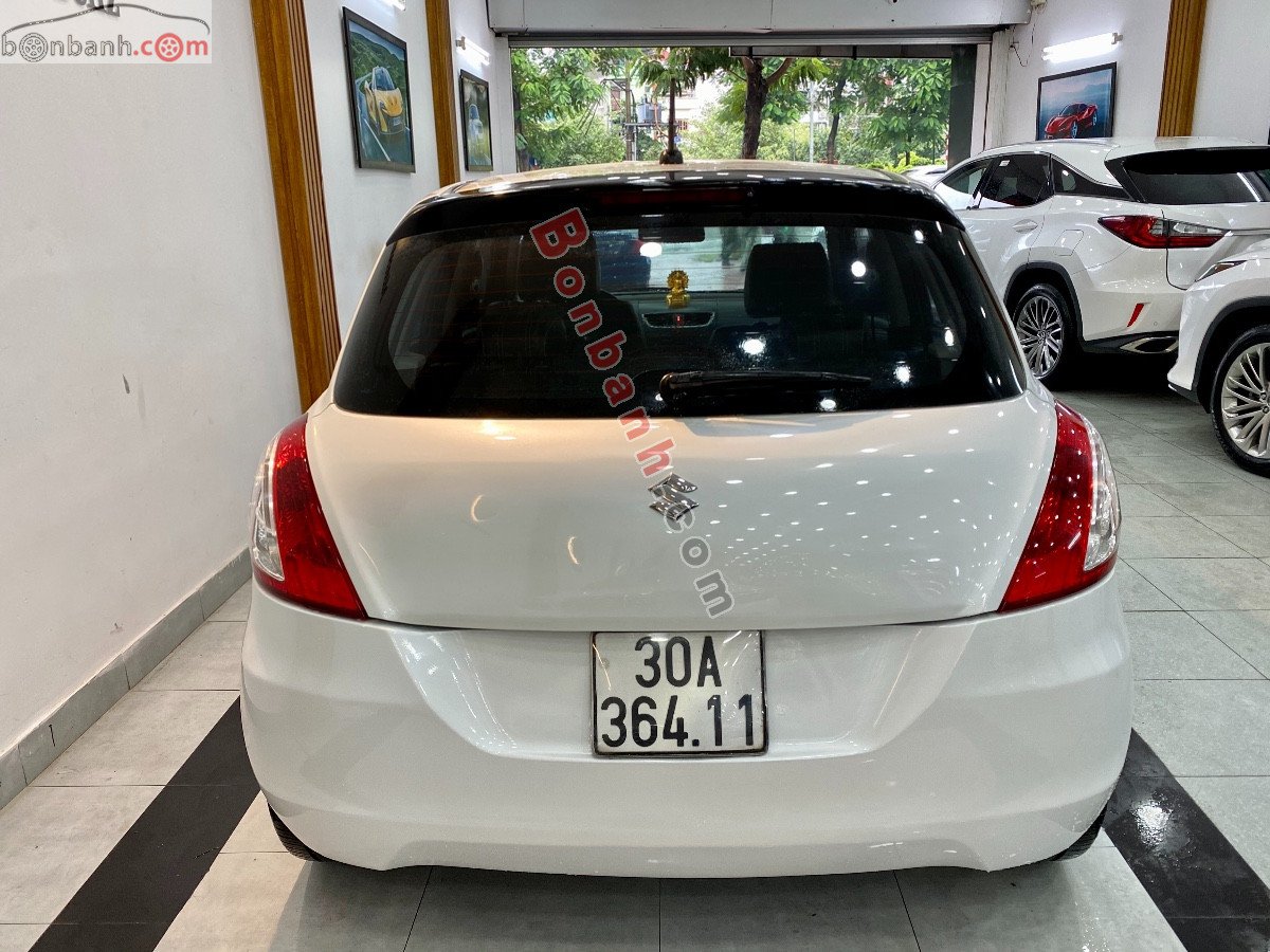 Suzuki Swift   1.4 AT  2014 - Cần bán xe Suzuki Swift 1.4 AT 2014, màu trắng chính chủ, giá chỉ 329 triệu