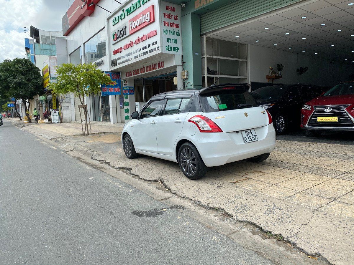 Suzuki Swift   2016 - Cần bán xe Suzuki Swift đời 2016, màu trắng  