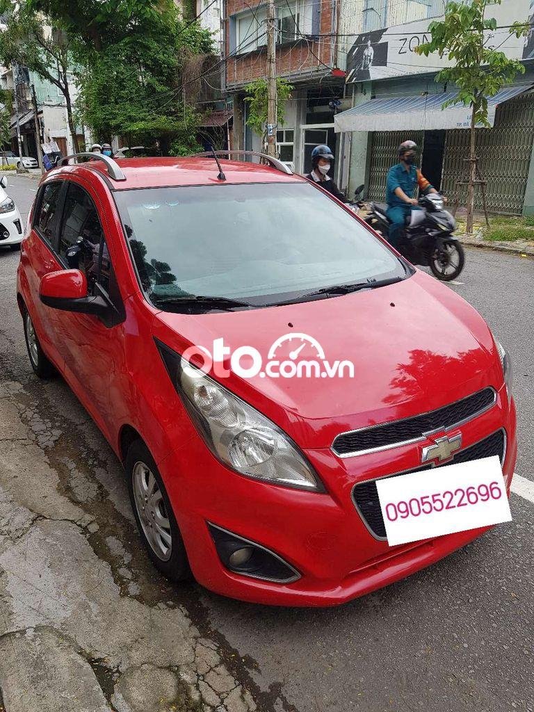 Chevrolet Spark    2013 - Cần bán gấp Chevrolet Spark năm sản xuất 2013, màu đỏ còn mới