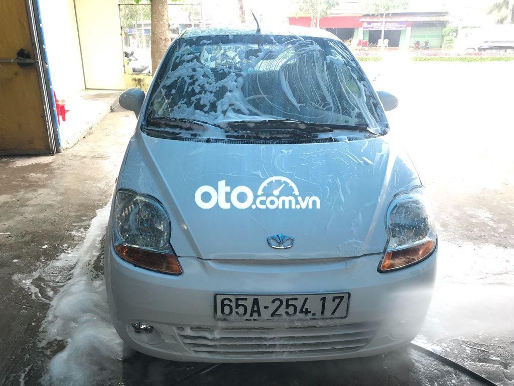 Daewoo Matiz    2011 - Cần bán gấp Daewoo Matiz đời 2011, màu trắng, nhập khẩu nguyên chiếc  