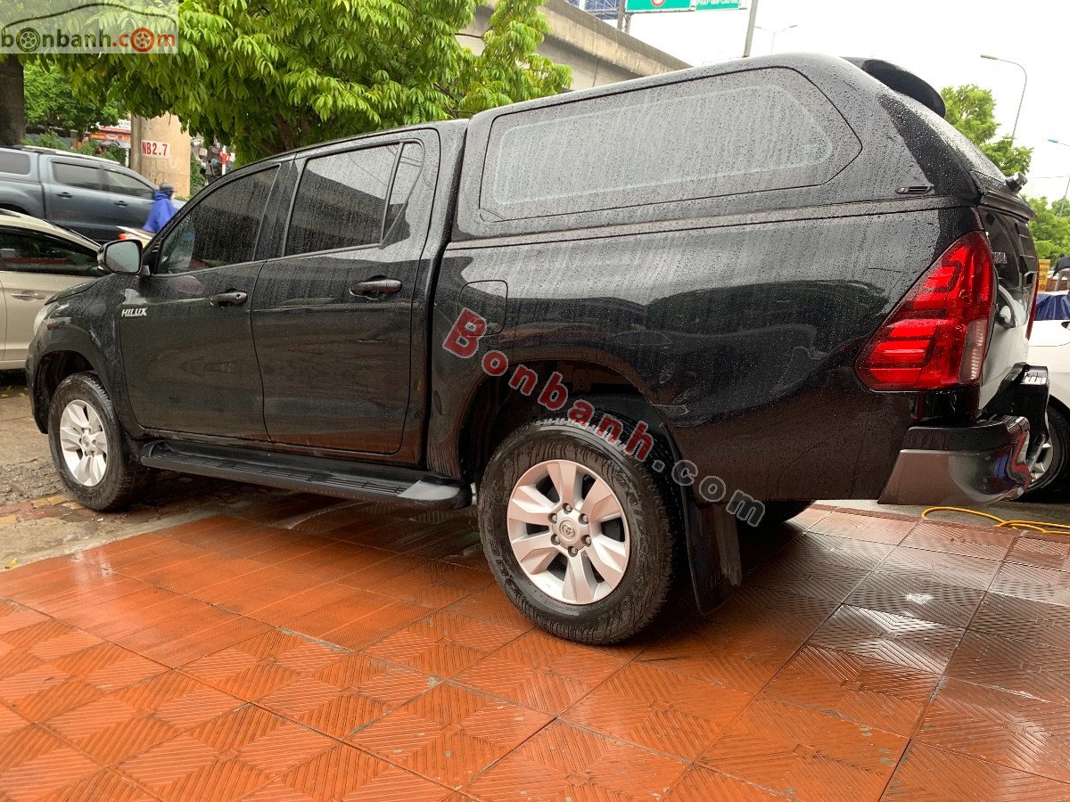 Toyota Hilux   2.4E AT  2020 - Cần bán xe Toyota Hilux 2.4E AT năm sản xuất 2020, màu đen, nhập khẩu 