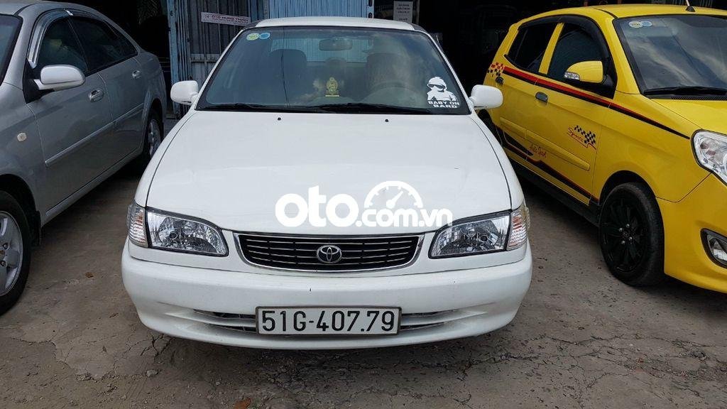 Toyota Corolla 1999 - Cần bán xe Toyota Corolla đời 1999, màu trắng, nhập khẩu nguyên chiếc giá cạnh tranh