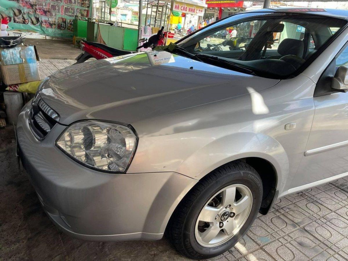 Daewoo Lacetti   EX  2010 - Cần bán lại xe Daewoo Lacetti EX đời 2010, màu bạc còn mới 