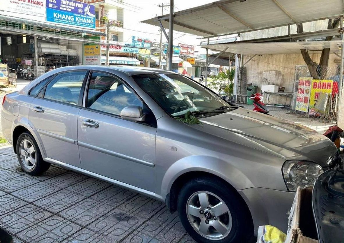 Daewoo Lacetti   EX  2010 - Cần bán lại xe Daewoo Lacetti EX đời 2010, màu bạc còn mới 