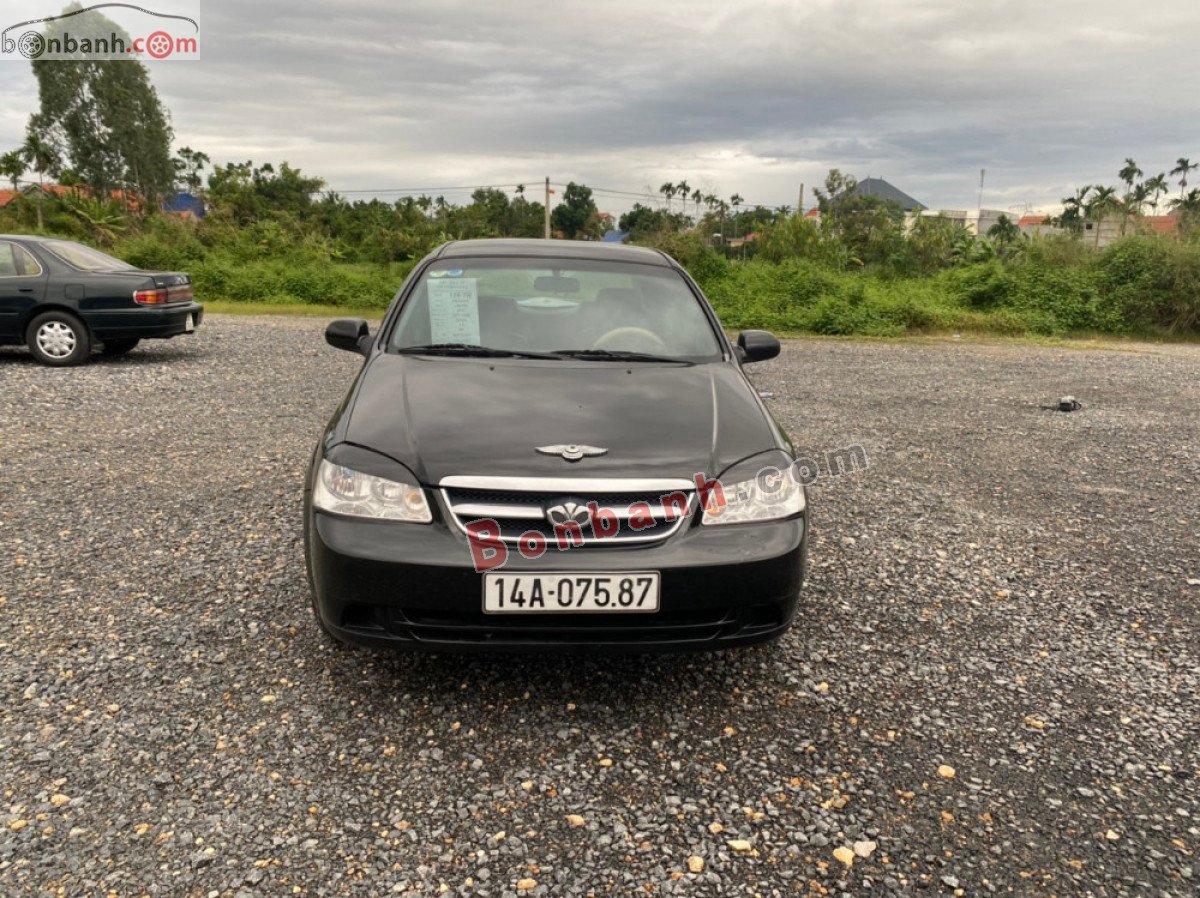 Daewoo Lacetti   2010 - Cần bán gấp Daewoo Lacetti sản xuất 2010, màu đen