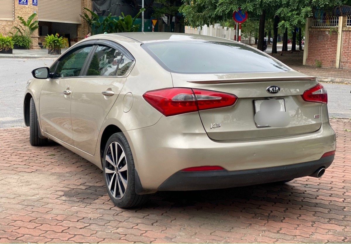 Kia K3   2.0 AT  2015 - Cần bán xe Kia K3 2.0 AT 2015, màu ghi vàng