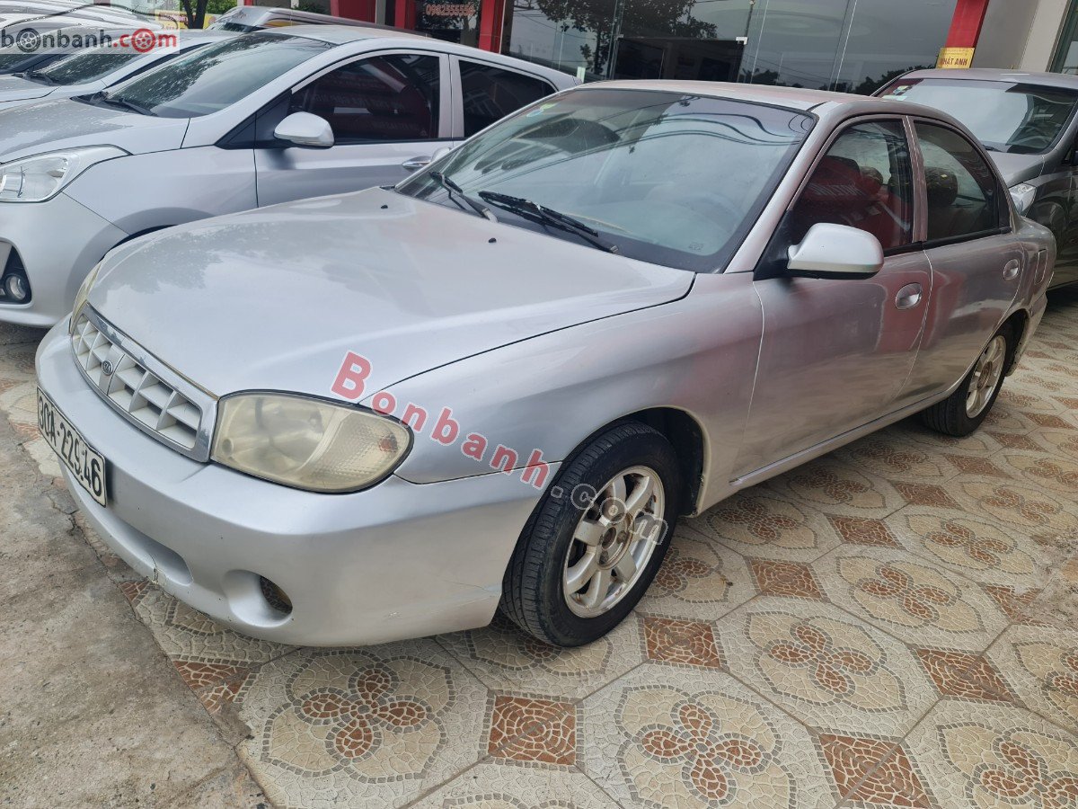 Kia Spectra 2003 - Cần bán Kia Spectra sản xuất năm 2003, màu bạc còn mới, giá tốt