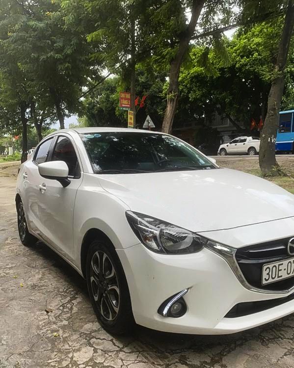 Mazda 2   1.5 AT   2016 - Cần bán lại xe Mazda 2 1.5 AT năm sản xuất 2016, màu trắng  