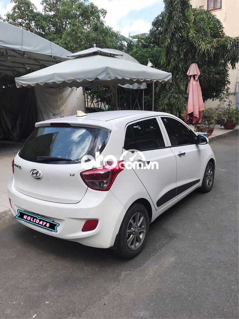 Hyundai Grand i10    2016 - Bán Hyundai Grand i10 năm sản xuất 2016, màu trắng, nhập khẩu xe gia đình, giá 325tr