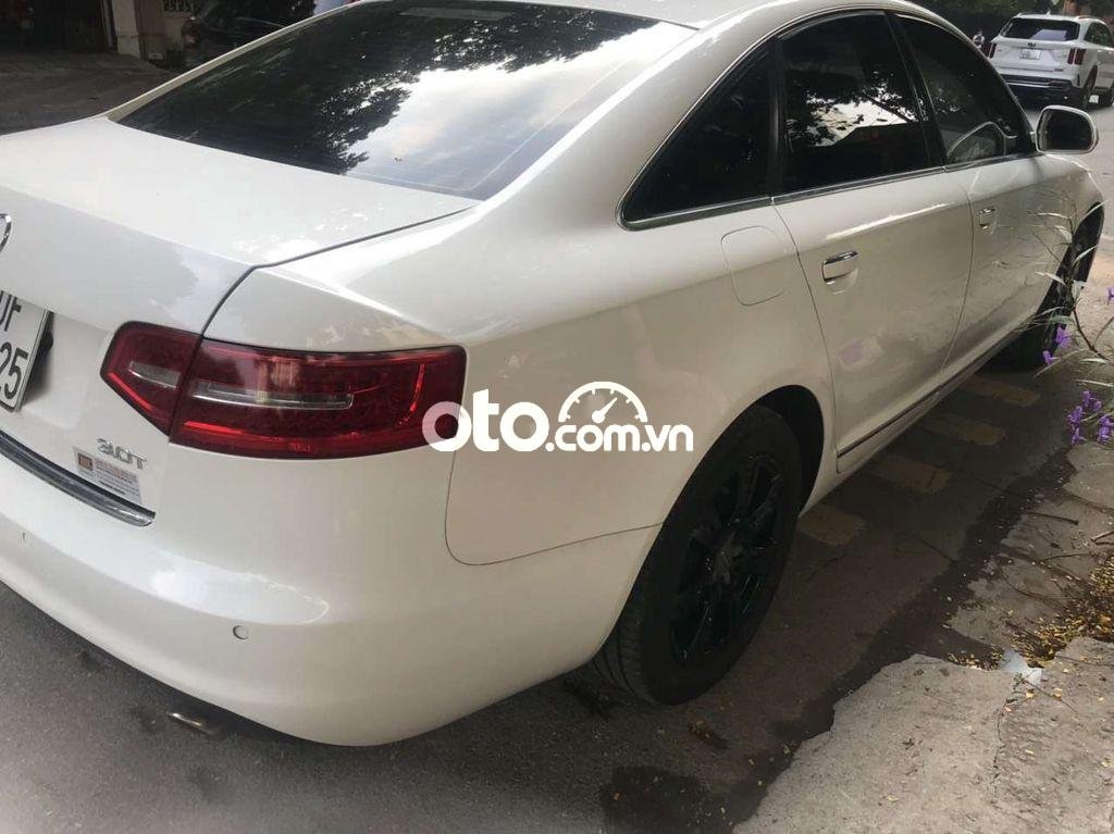 Audi A6   3.0T Quattro  2009 - Cần bán Audi A6 3.0T Quattro đời 2009, màu trắng, xe nhập giá cạnh tranh