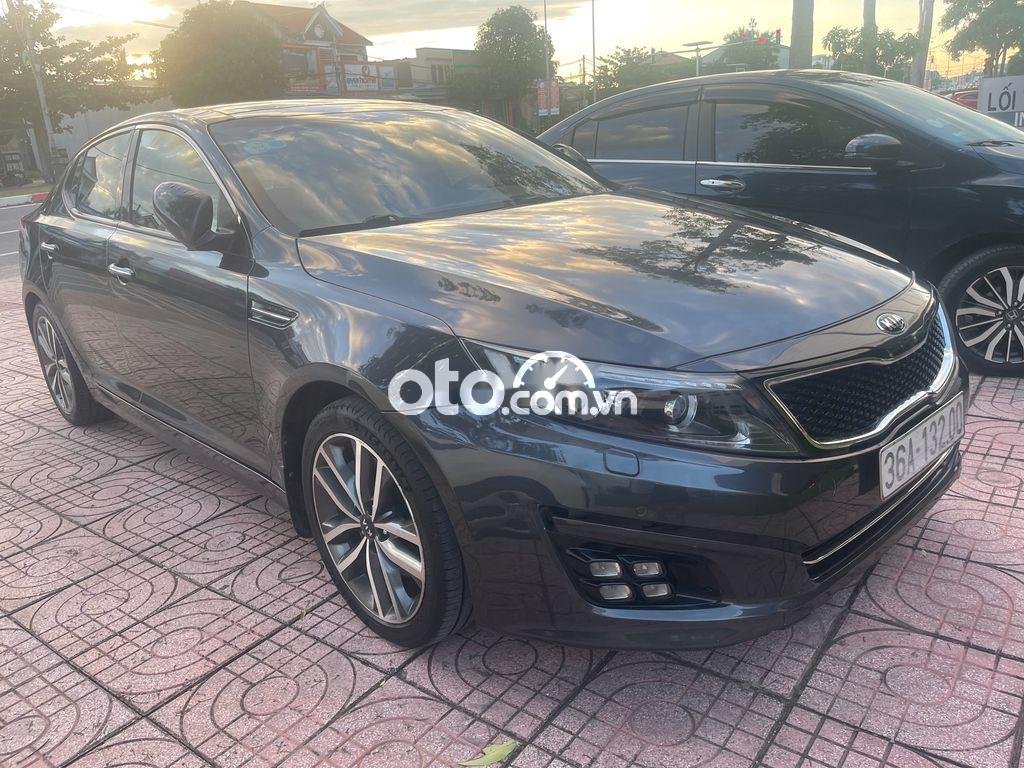 Kia Optima 2014 - Cần bán Kia Optima sản xuất 2014, màu xám xe gia đình