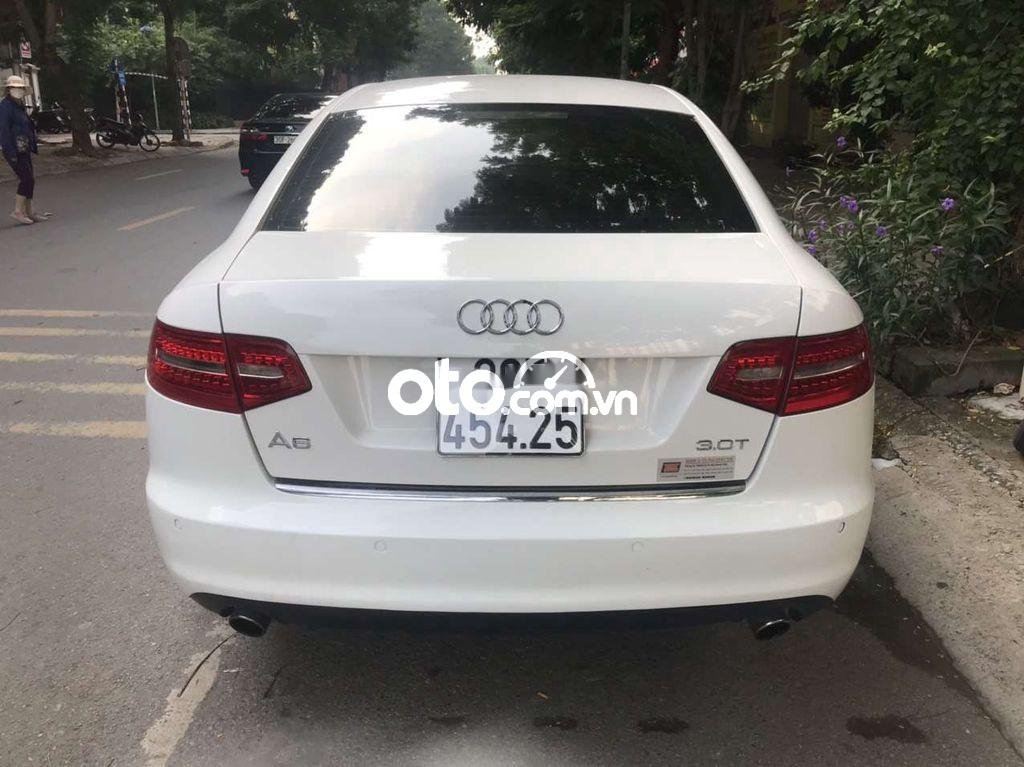 Audi A6   3.0T Quattro  2009 - Cần bán Audi A6 3.0T Quattro đời 2009, màu trắng, xe nhập giá cạnh tranh