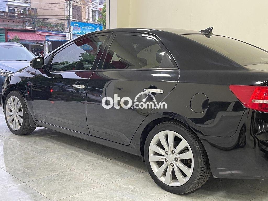 Kia Forte 2010 - Bán Kia Forte đời 2010, màu đen