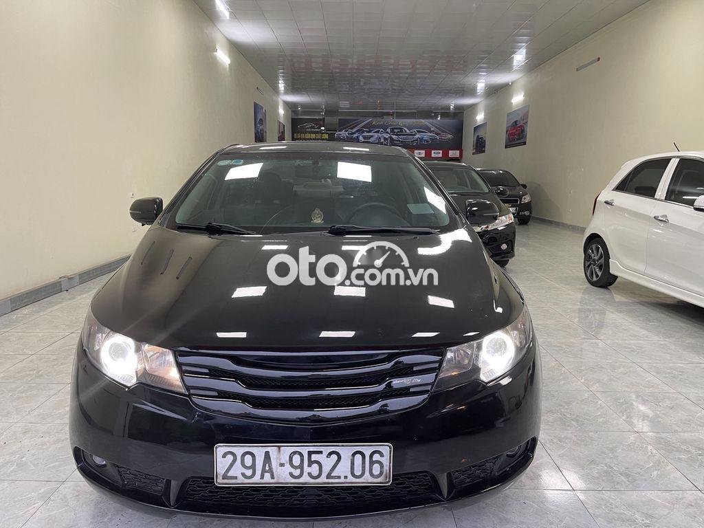 Kia Forte 2010 - Bán Kia Forte đời 2010, màu đen