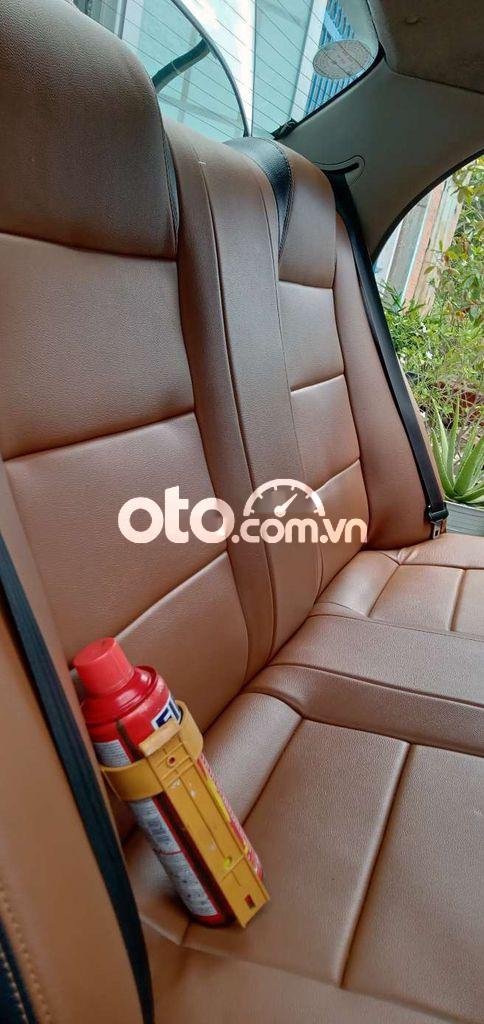 Daewoo Lanos 2005 - Cần bán Daewoo Lanos sản xuất năm 2005, màu trắng, nhập khẩu nguyên chiếc, giá tốt