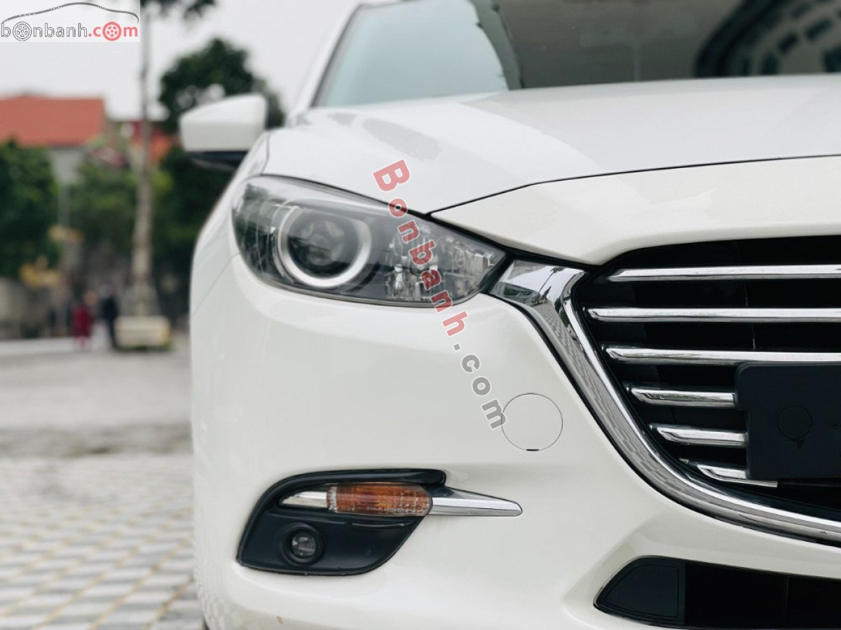 Mazda 3   1.5 AT 2018 - Cần bán lại xe Mazda 3 1.5 AT năm 2018, màu trắng, giá chỉ 599 triệu