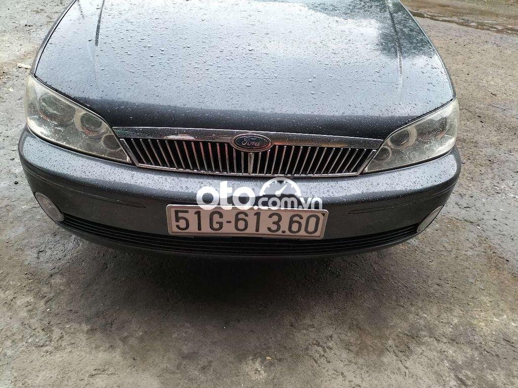 Ford Laser 2002 - Cần bán gấp Ford Laser sản xuất năm 2002, màu xám, xe nhập