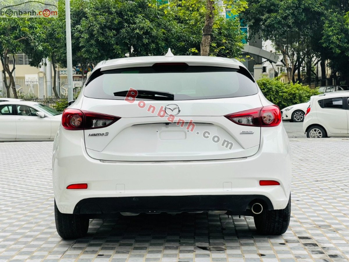 Mazda 3   1.5 AT 2018 - Cần bán lại xe Mazda 3 1.5 AT năm 2018, màu trắng, giá chỉ 599 triệu