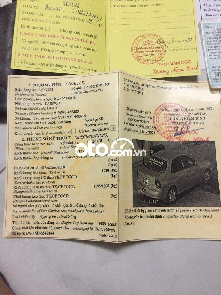 Daewoo Lanos 2002 - Cần bán lại xe Daewoo Lanos sản xuất 2002, màu vàng, nhập khẩu nguyên chiếc