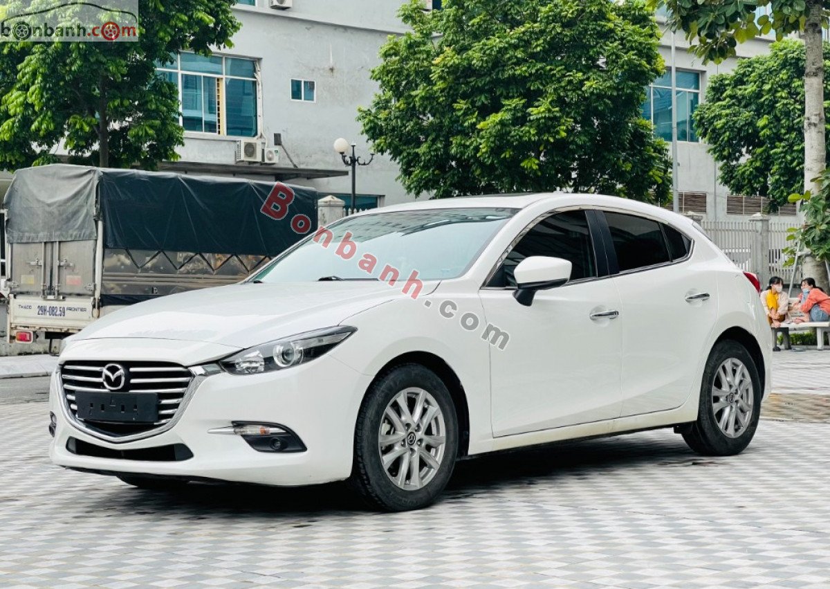 Mazda 3   1.5 AT 2018 - Cần bán lại xe Mazda 3 1.5 AT năm 2018, màu trắng, giá chỉ 599 triệu