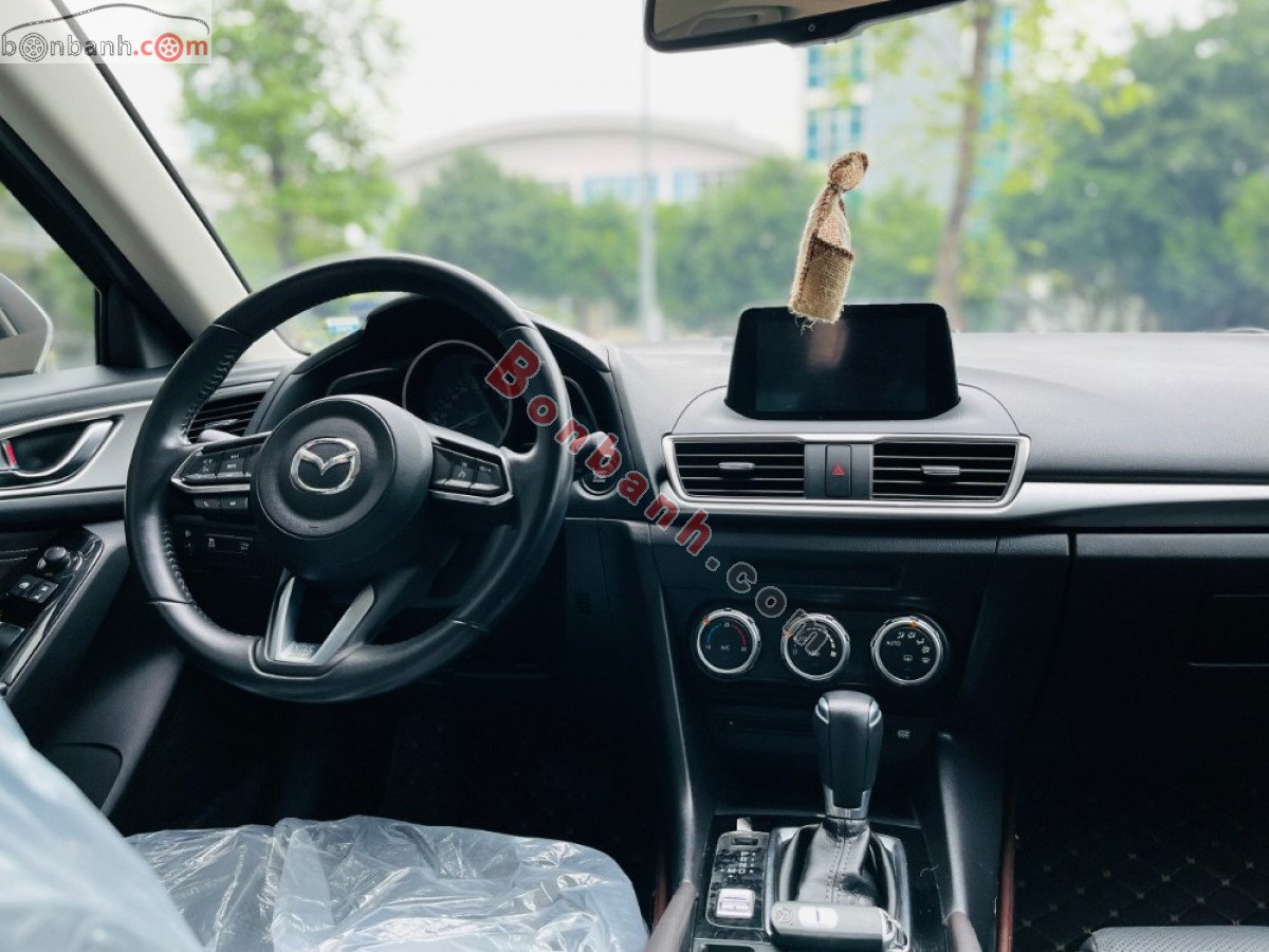 Mazda 3   1.5 AT 2018 - Cần bán lại xe Mazda 3 1.5 AT năm 2018, màu trắng, giá chỉ 599 triệu