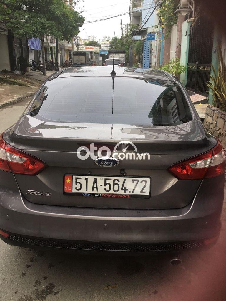 Ford Focus Titanium 2013 - Cần bán lại xe Ford Focus Titanium năm 2013, màu nâu xe gia đình