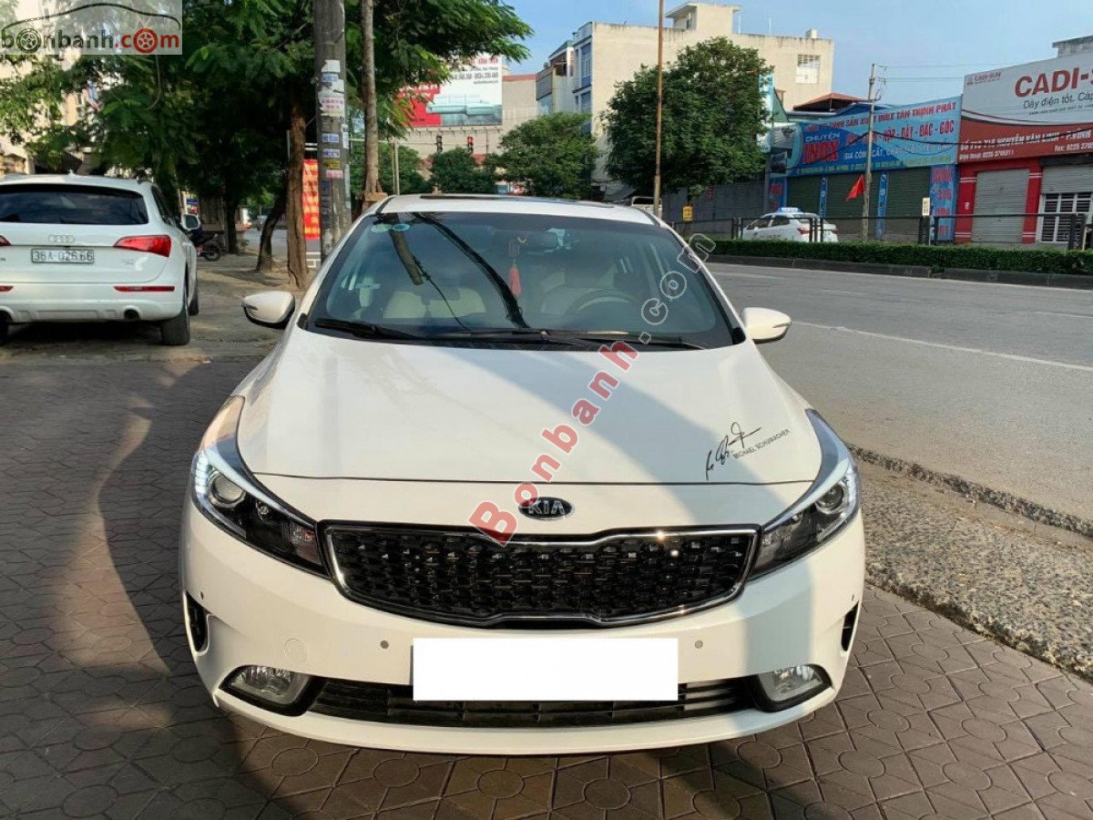 Kia Cerato   1.6AT  2018 - Cần bán lại xe Kia Cerato 1.6AT sản xuất 2018, màu trắng còn mới, 505 triệu