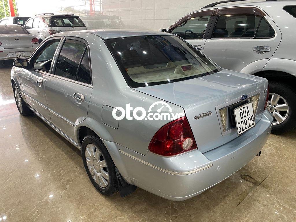 Ford Laser 2004 - Xe Ford Laser sản xuất năm 2004, màu bạc, nhập khẩu