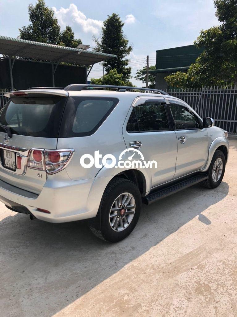 Toyota Fortuner 2013 - Cần bán lại xe Toyota Fortuner sản xuất năm 2013, màu bạc