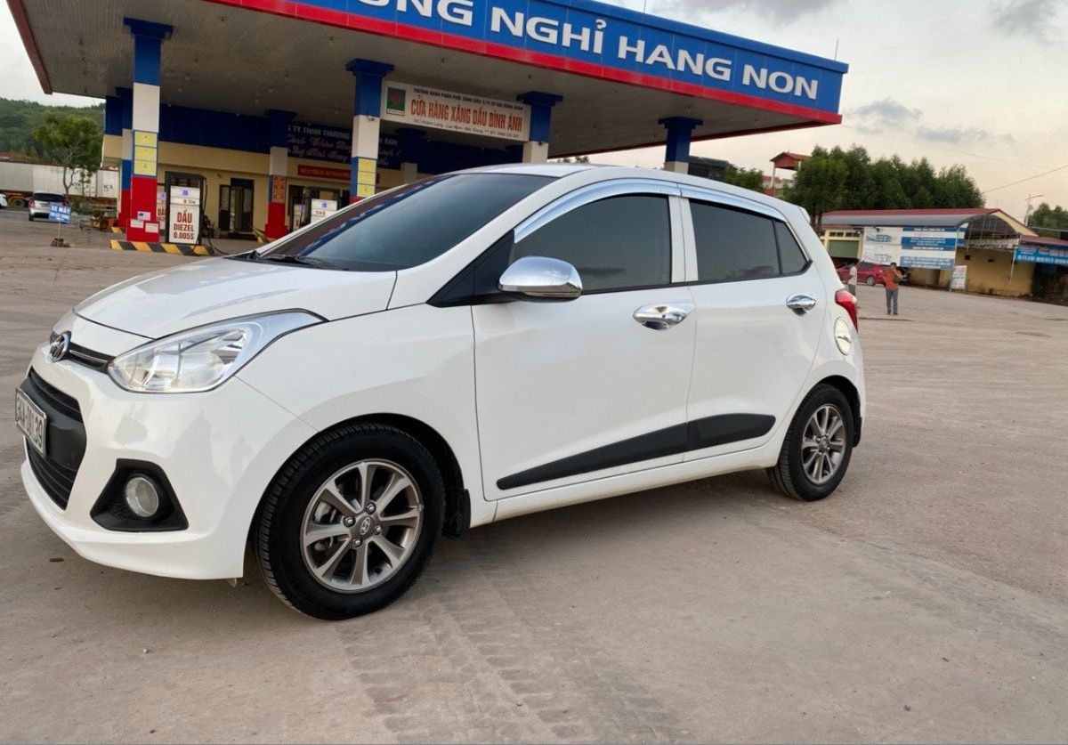 Hyundai Grand i10 2014 - Bán Hyundai Grand i10 năm sản xuất 2014, màu trắng, nhập khẩu nguyên chiếc còn mới, giá chỉ 305 triệu