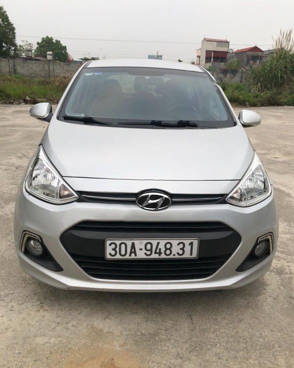 Hyundai Grand i10 2015 - Bán Hyundai Grand i10 sản xuất năm 2015, màu bạc, nhập khẩu nguyên chiếc xe gia đình, 290tr