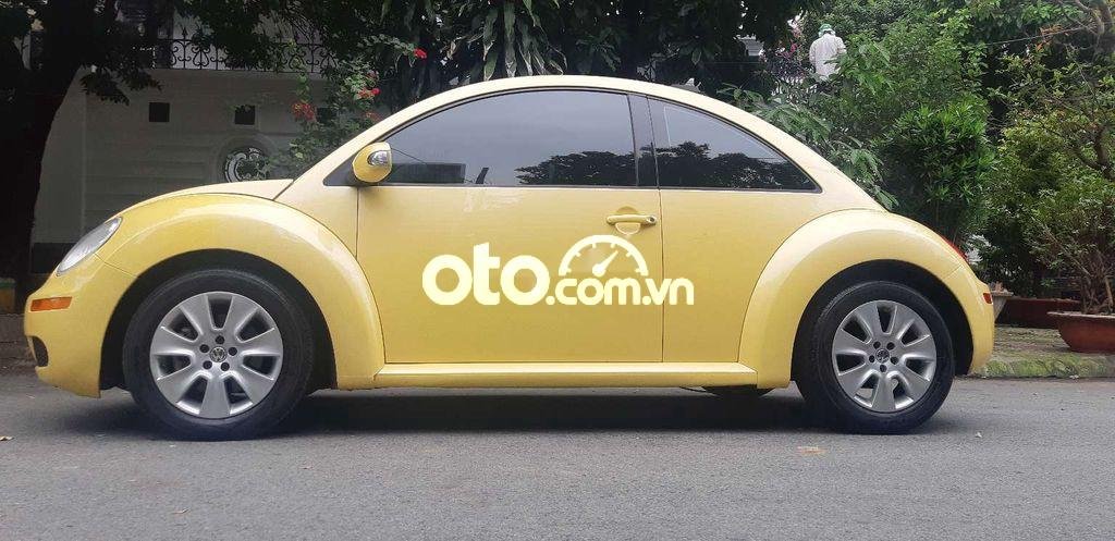 Volkswagen New Beetle   2007 - Cần bán xe Volkswagen New Beetle sản xuất 2007, màu vàng, nhập khẩu nguyên chiếc