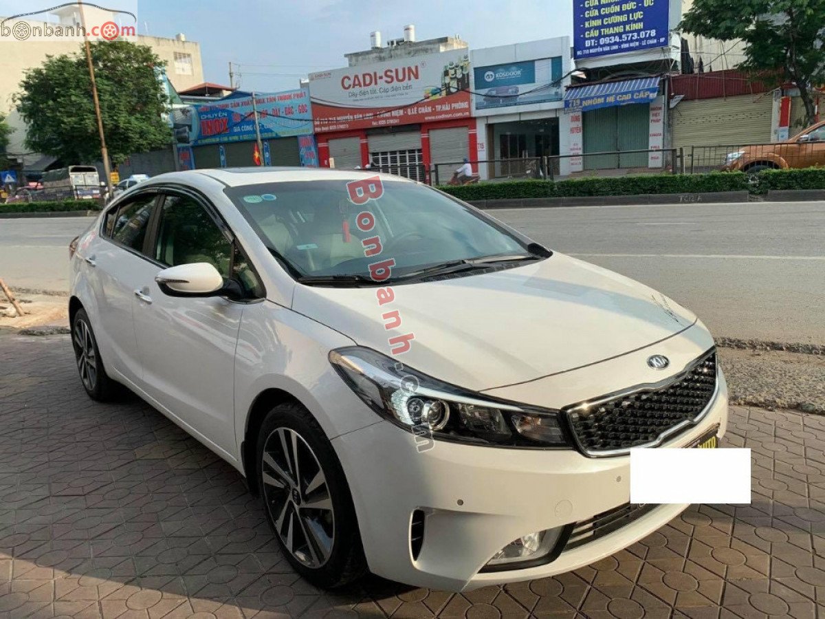 Kia Cerato   1.6AT  2018 - Cần bán lại xe Kia Cerato 1.6AT sản xuất 2018, màu trắng còn mới, 505 triệu