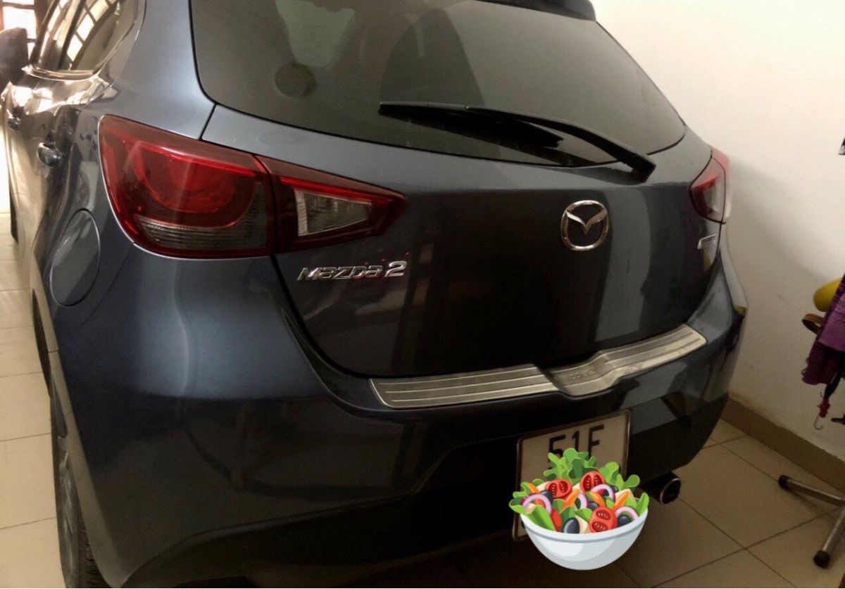 Mazda 2 2016 - Cần bán gấp Mazda 2 sản xuất 2016, màu xanh lam còn mới giá cạnh tranh